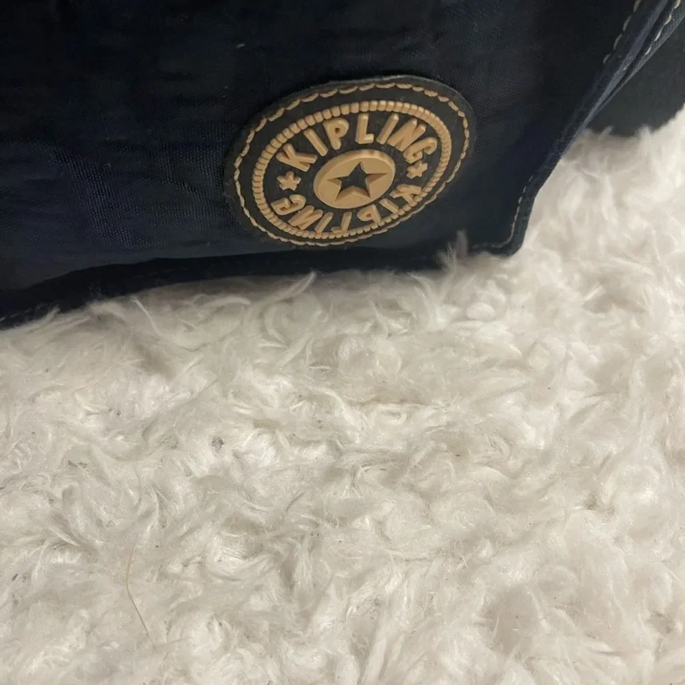 Kipling Nylon Expandable Navy Blue Large Messenger Bag  Key Clip. Black strap .